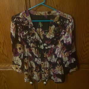 Black yellow magenta floral top with ruffles at neck line at button front